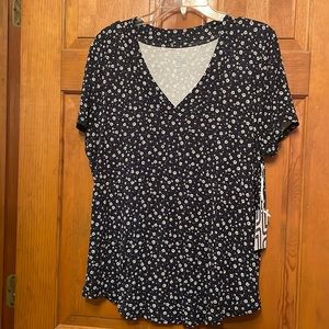 Delicate flower pattern on this blouse are so sweet!